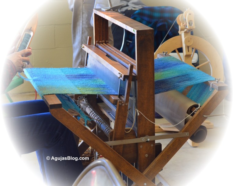 One of the Fiber to Fashion teams working on their woven shawl.