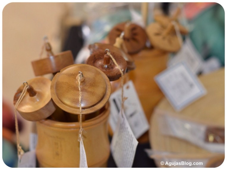 These wooden spindles are from Yarnorama (I think). I didn't pick up a business card. (www.yarnorama.com)